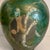 Large vase with matte black reduction lines, and highly unique mottled turquoise, jade, and copper-green glazes all the...