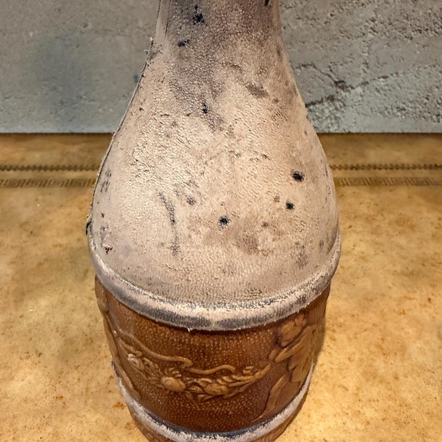 For your consideration, an Italian leather-wrapped bottle, possibly from the 1970s or earlier. Dimensions: 12" H x 4"...
