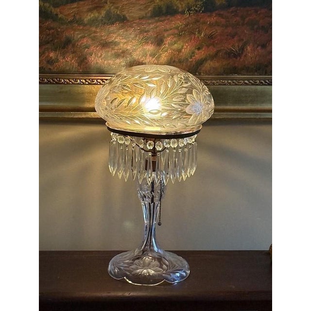 Fine Quality Antique Cut Crystal Table Lamp featuring a deeply and intricately carved floral and foliage designs on the...