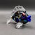 Bruce Fruend Signed Iridescent Dichroic Millefiori Eyes Hand Blown Art Glass Fish Sculpture. Measures approximately 6"...
