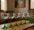 A vibrant set of 6 vintage Luminarc Durand France wine glasses, featuring the iconic emerald green stem that has become a...