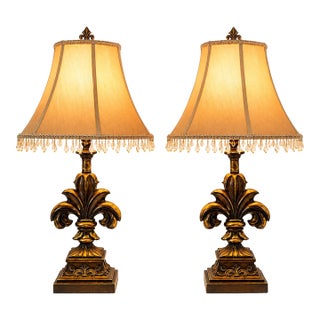 Late 20th Century Pair of Gilded Fleur-De-Lis Table Lamps With Original Crystal Fringe Shades, 28”h For Sale