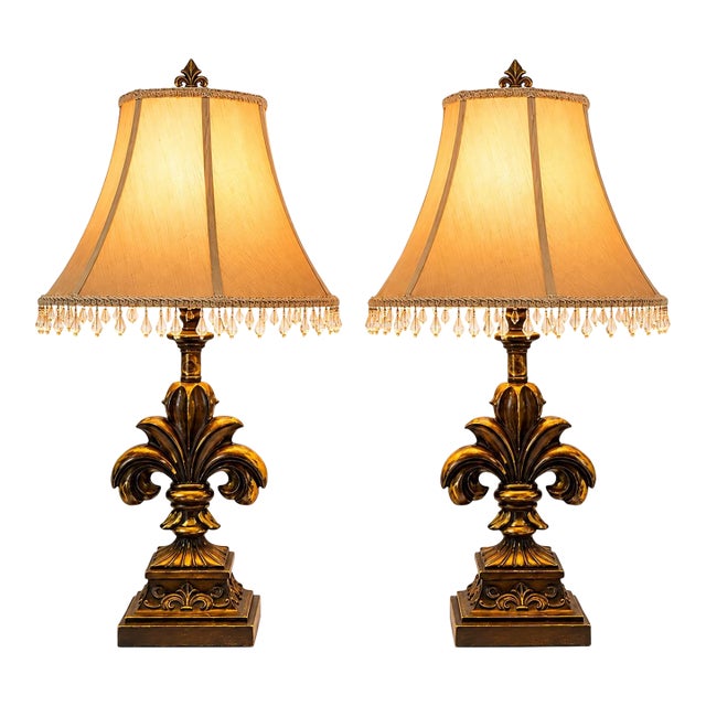 Late 20th Century Pair of Gilded Fleur-De-Lis Table Lamps With Original Crystal Fringe Shades, 28”h For Sale
