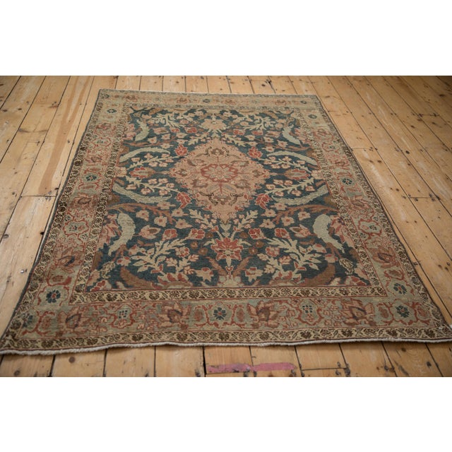 :: Diamond shaped center medallion with oversized scrolled serrated leaves and long stemmed vines with blossoms inwardly...