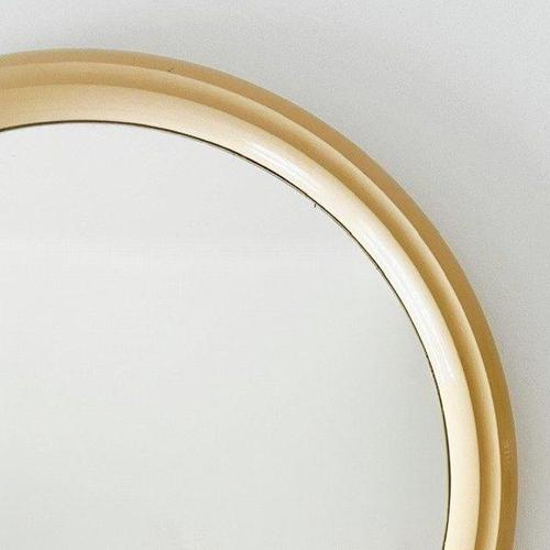 Vintage mid-century retro round Space Age Tiger wall mirror in beige plastic from the 1970s. This retro mirror is in good...