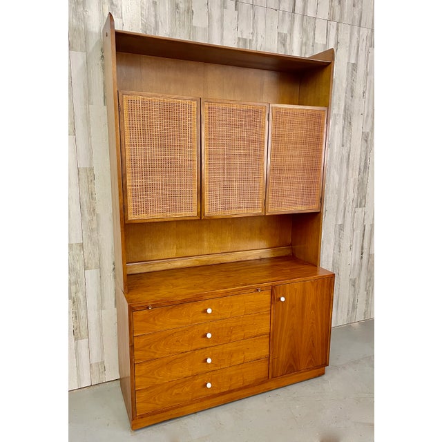 Drexel Declaration Walnut & Cane cabinet designed by Stewart MacDougall and Kipp Stewart. Iconic design with walnut and...