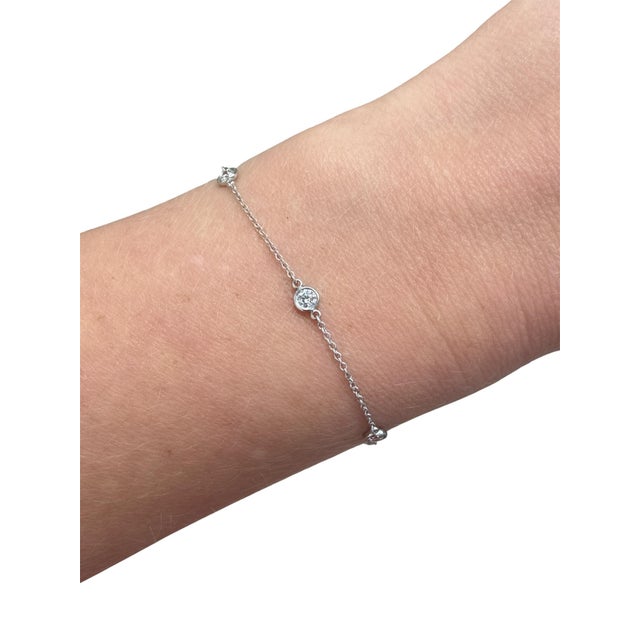 A delicate design by Elsa Peretti for Tiffany & Co. from their Diamonds by the Yard Collection. The bracelet features a...