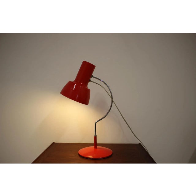 Mid-Century Red Table Lamp from Napako, 1960s, in Very Good conditions. Designed 1960 to 1969 This piece is attributed to...