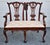 Vintage (1990's) Settee has a Chippendale Style. Made of Wood. Mahogany. Carved. Ball & Claw Feet. The Measurements: 44"W...