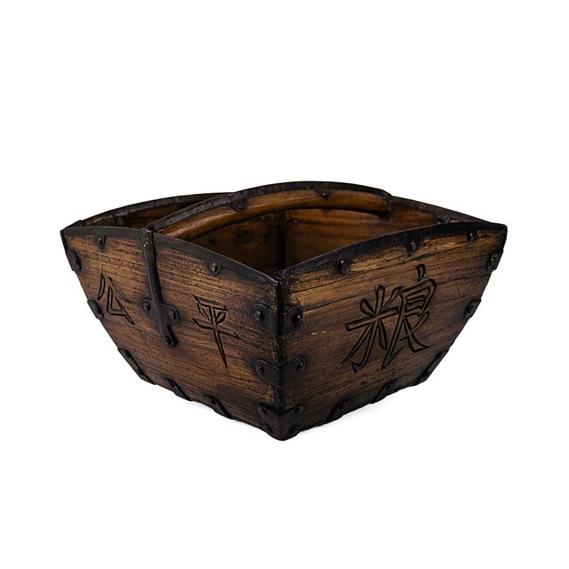 Antique Chinese wooden grain bucket (called a dou (斗)), historically used for measuring and transporting rice. Dating from...