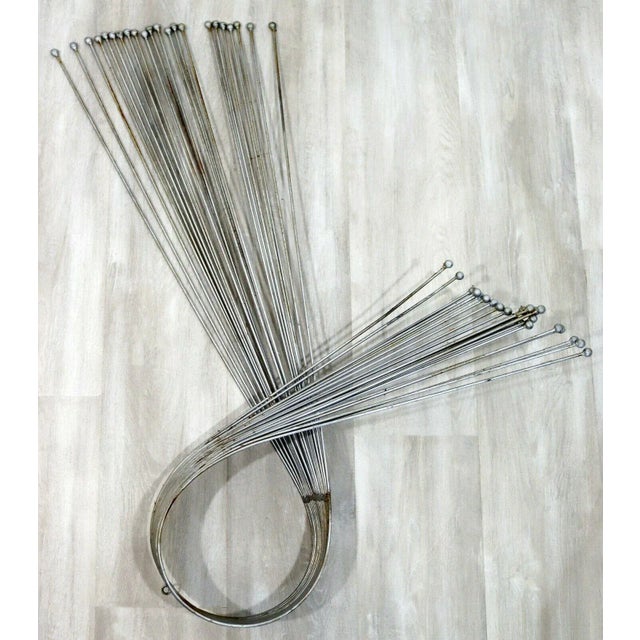 For your consideration is a marvelous, metal wire swirl wall sculpture, in the style of Curtis Jere, circa the 1980s. In...