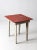 This is a rustic vintage side table. The charmingly weathered wooden farmhouse table features a painted red top with white...
