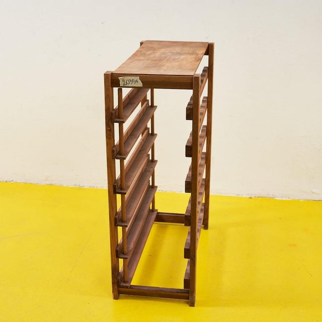 Discover the timeless charm of this solid wood wine cabinet. With a warm and inviting finish, this unique piece is ideal...