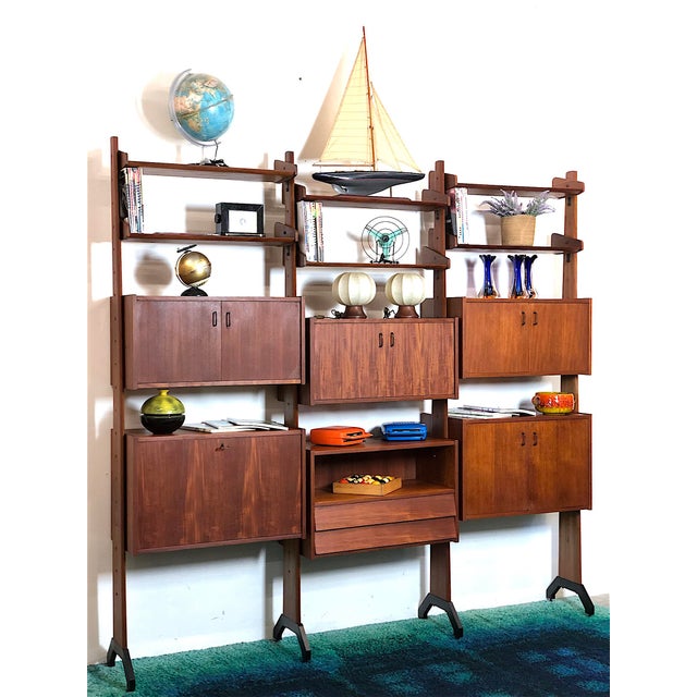 1960s modular 3-bay bookcase designed by vittorio dassi, italian-made, completely restored and sanitized. The bookcase is...