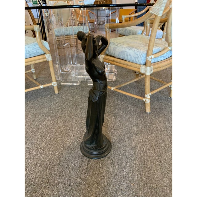 Add a touch of sophistication and timeless beauty to your home or office with this exquisite small bronze statue of a...