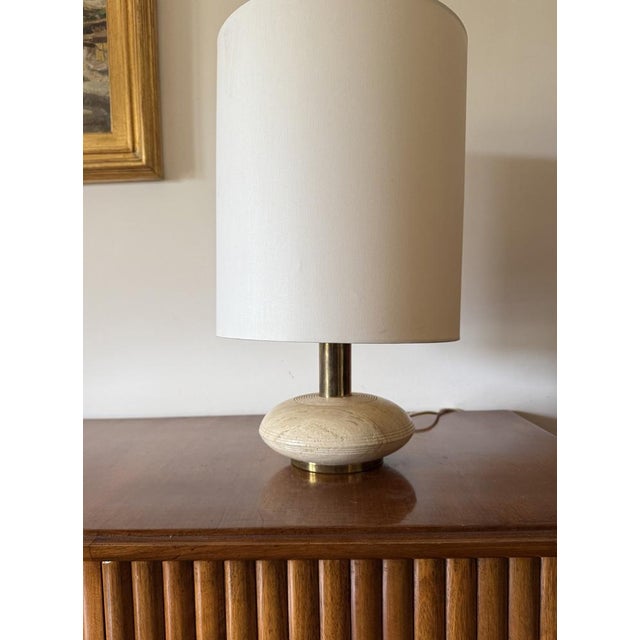 Mid-century modern travertine & brass table lamp Italy 1970s Brass, travertine Lampshade not included Labels under the...
