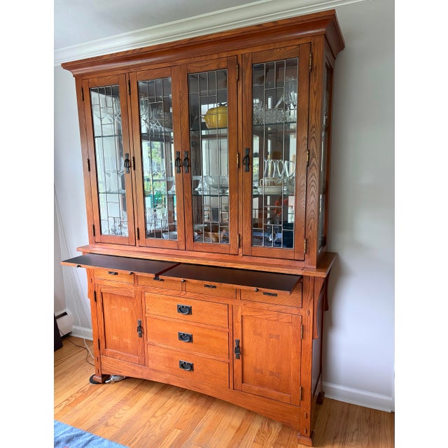 Lovingly cared for oak china cabinet hutch. In the style of Stickley Mission Oak Arts & Crafts pieces. China Cabinet top...