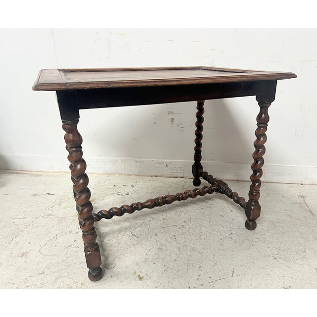 Louis xiii style writing desk in solid walnut four legs and a twisted wood stretcher walnut top good condition dimensions:...