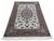 Fine Persian Isfahan rug, hand knotted in Iran from 100% wool with delicate silk highlights. Measuring 4’9” x 7’4”, this...