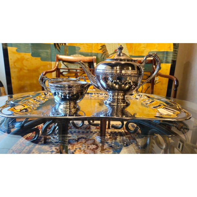 Elegant , Victorian classical silver plated teapot, creamer, sugar bowl and service plate, marks silver plated on copper.,...