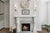 Handsome pair of vintage cast iron fireplace andirons featuring classic cannonball finials, tapered baluster-form...
