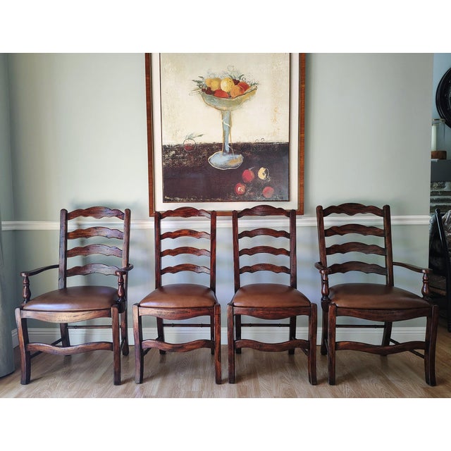 These Theodore Alexander dining chairs are from the Castle Bromwick collection. The set includes two armchairs and 2 side...