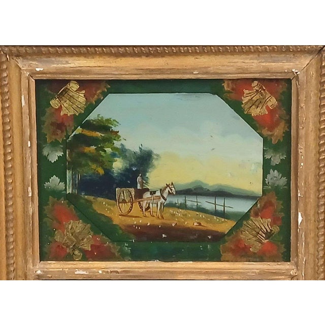 Federal trumeau mirror with giltwood frame, reverse painted panel depicting a country scene with a horse and carriage;...