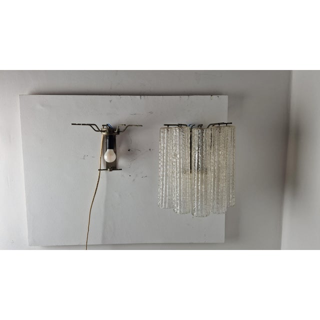 Vintage Wall Lamps in Iron with Cylindrical Murano Glass Pendants, 1960s, Set of 2, in Very Good conditions. Designed 1960...