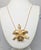 1960s Vintage 1964 Signed Napier Goldtone & Faux-Pearl Orchid Pendant Necklace For Sale - Image 5 of 11