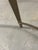 Pristine Baker coffee table in antique brass with heavy glass top. The table is like new with no blemishes or scars. The...