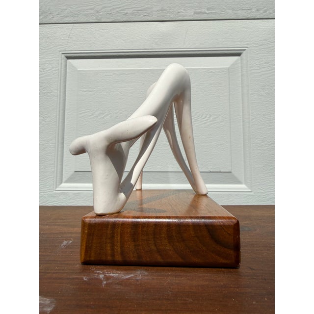 Stunning Roselane ceramic white deer figurine on a wooden display platform made in Pasadena, California during the heyday...