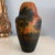 Beautiful Daum Nancy Cameo glass vase depicting a forest and lake. Featuring a stunning background of mottled red , yellow...