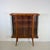 This distinctive 1950s display cabinet, originating from Poland, immediately catches the eye with its elegant curved Art...
