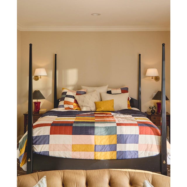 Comfort meets style with our Multi-Check Patchwork Quilt Bedding: a modern patchwork quilt featuring a vibrant checkered...
