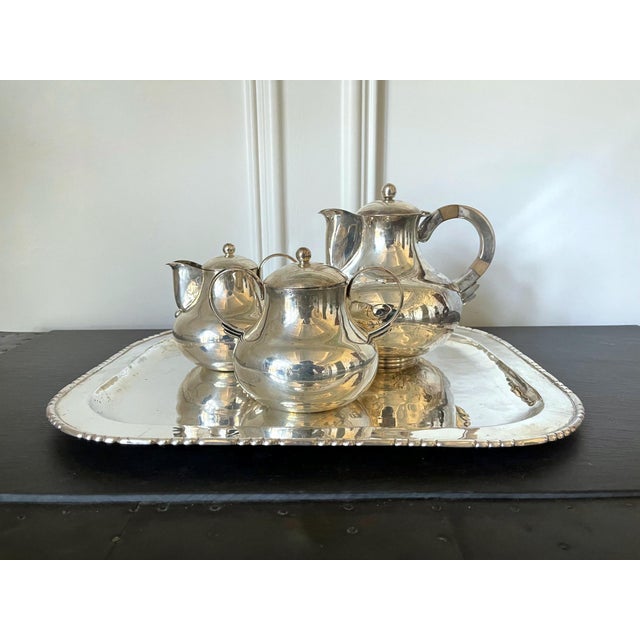 An early four-pieces sterling silver coffee or tea serve set by Hector Aguilar (1905-1986) circa 1940-1945 per mark "HA,...