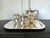 An early four-pieces sterling silver coffee or tea serve set by Hector Aguilar (1905-1986) circa 1940-1945 per mark "HA,...