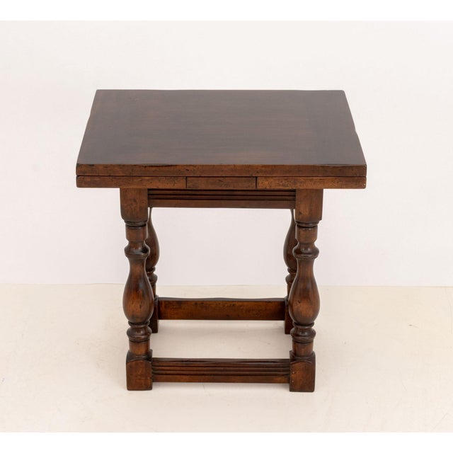 Victorian Oak Draw-Leaf Table, on four turned wood legs conjoined by box stretcher. Closed: 29" H x 29" W x 24" D; open:...