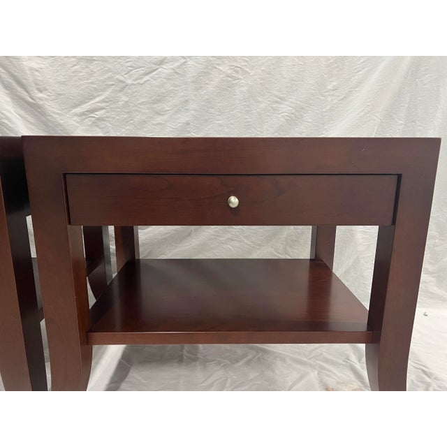 Beautiful walnut night stands in walnut finish with soft close drawers. Satin nickel hardware. The tables are unmarked,...