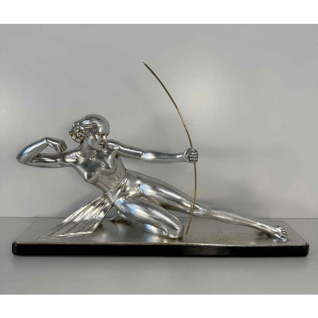 Elegant Art Deco sculpture depicting Diana the Huntress with a bow, created in the 1930s by Italian sculptor Salvatore...