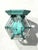 vintage-inspired petite wall lantern. Crafted from solid brass, this pocket-sized sconce boasts a remarkable, verdigris...