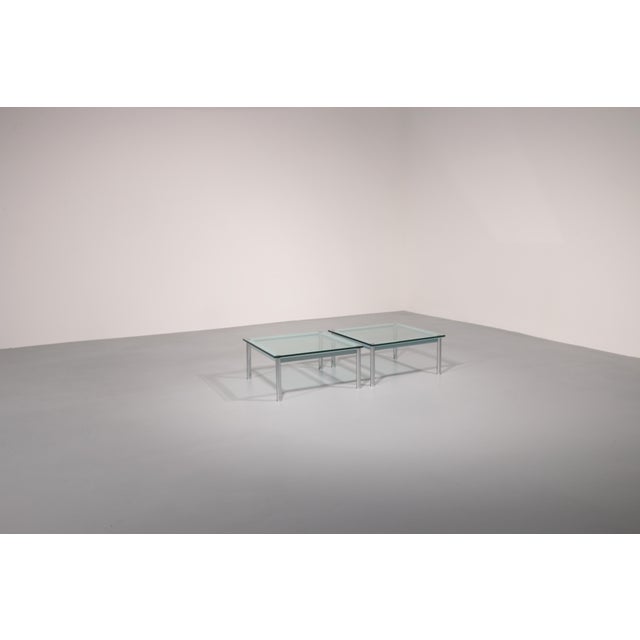 This cassina lc-10 coffee table is a true icon of modern design, created in collaboration with le corbusier and produced...