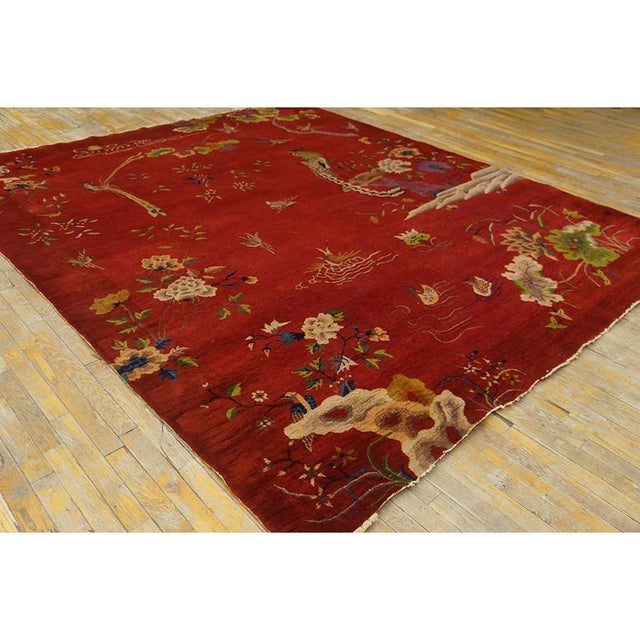Red 1920s Antique Wool Hand Knotted Pile Rectangle Rug, Circa Date: 1920s. This remarkable piece exemplifies the finest...
