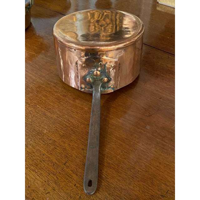 19th century copper cooking pot with wrought iron handle from England. An excellent addition for the collector of old...