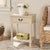 Classic farmhouse charm meets contemporary decor in this Athena Accent Table. Athenas modernized ball-turned legs are...