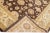 Beautiful Paki Peshawar hand-knotted wool rug with a brown color field. This modern rug has a beige and golden frame with...