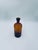 Vintage-style apothecary bottle, made of high-quality glass. The bottle is stained brown to protect the contents from UV...