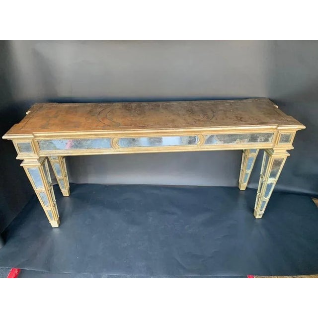 Large wood mirrored console made in Italy, c. 1920's. Dimensions: 34"H x 72"W x 21"D