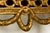 Sourced in Provence, France, this exceptional pair of late 18th-century French Louis XVI giltwood demilune console tables...