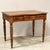Coffee table - writing desk Solid walnut, with 3 drawers Late 19th century Dimensions: width 100 cm, depth 61 cm, height...