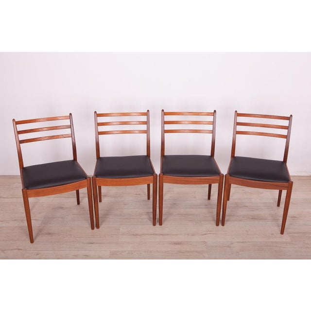This set of four dining chairs was produced by G-Plan in the United Kingdom circa 1960. It was designed by Victor Wilkins....